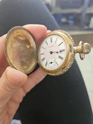 antique Columbia pocket watch, likely manufactured by the Waltham Watch Company