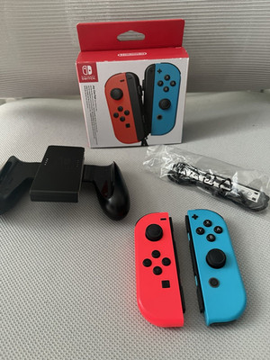 Nintendo Joy-Con Controller Set Rot/Blau inkl. Grip & Handschlaufe
