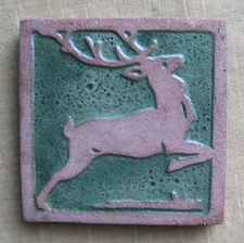Greuby tile, Leaping deer with green glaze, unsigned, 4" square