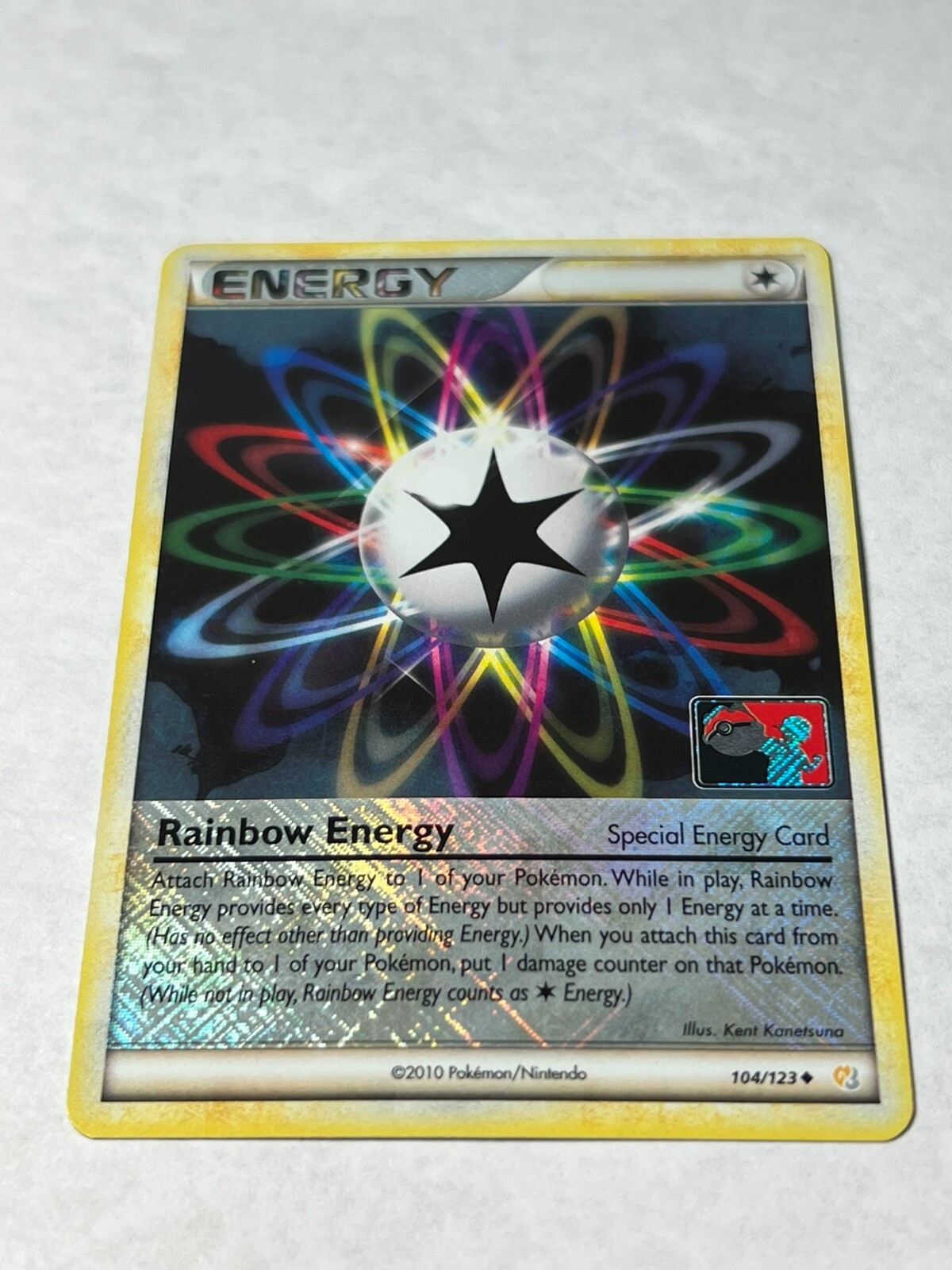 Rainbow Energy (League Promo) 104/123 League & Championship Card Reverse Holo LP