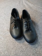 Capezio Girls Cadence Tap Shoes In Black Patent Leather.