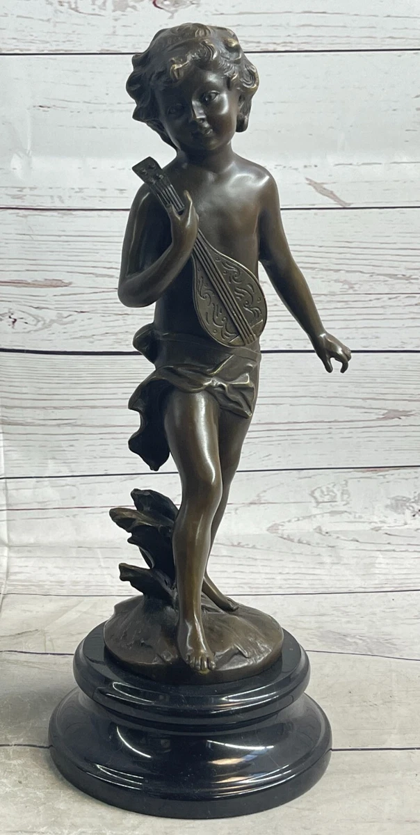 statuette figurine de porcelaine musicien