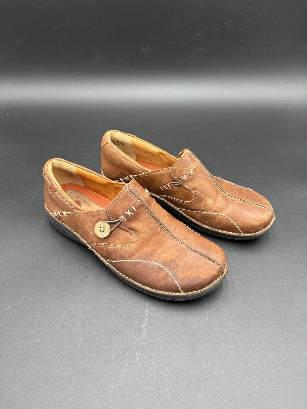 Mocassino donna Clarks slip on bottoni fiori marrone scuro 8 5 cuciture superiori boho