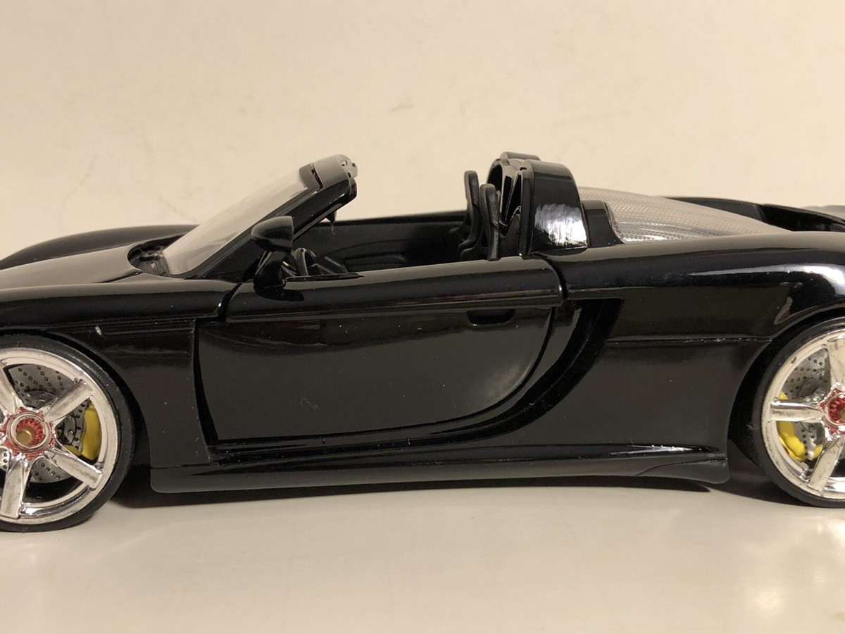 JADA DUB CITY 2005 PORSCHE CARRERA GT BLACK 1:24 DIECAST MODEL CAR