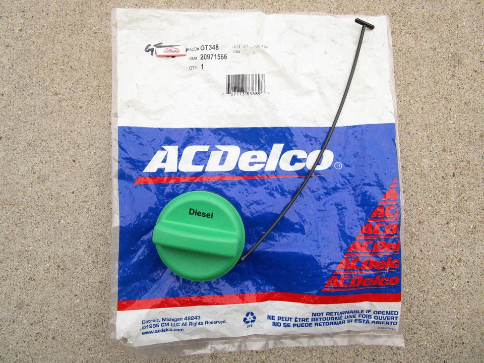 GM CHEVY GMC 20971566 ACDELCO GT348 TAPA DE LLENADO DEL TANQUE DE COMBUSTIBLE DIÉSEL CON CORREA FABRICANTE DE EQUIPOS ORIGINALES NUEVO Foto 2 de 4