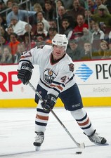 Marc Andre Bergeron Edmonton Oilers controls the puck at the- Ice Hockey Photo