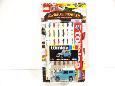 Tomy Toyota Land Cruiser mit Tomica Katalog 1975 in OVP 1:59 Modell Auto