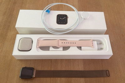 Apple Watch Series 4 44mm Edelstahl Gold, rosa Armband, Ladekabel & Box