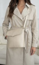 Sac bandoulière vintage Longchamp en cuir beige pièce iconique parisienne