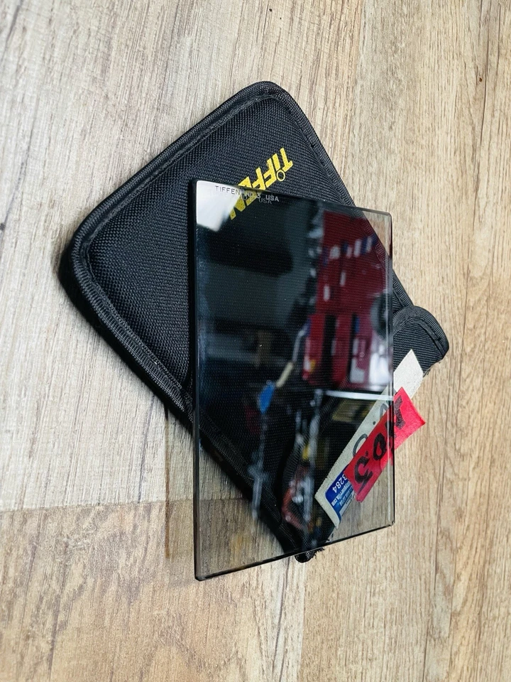Tiffen 4x5.65" 0.3 ND Filter - w hairline scratches but dont show up in imagery - Image 3 of 4
