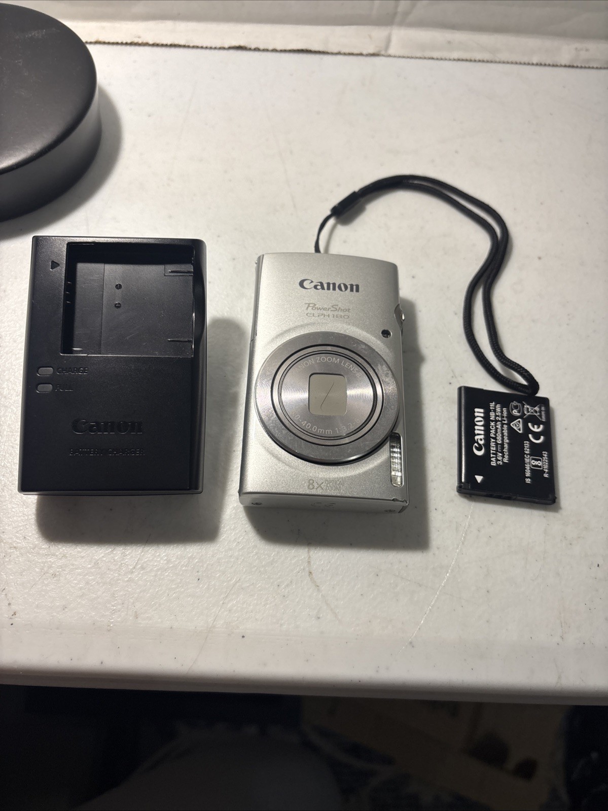 Canon PowerShot ELPH 180 Silver Digital Camera Battery And Charger