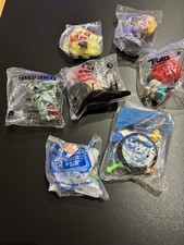 Lot of 7 McDonald  s Happy Meal Toys   2010 to 2025  SEALED Disney  More