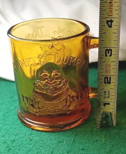 Vintage Humpty Dumpty/Tom the Pipers Son Pressed Amber Colored Glass with Handle