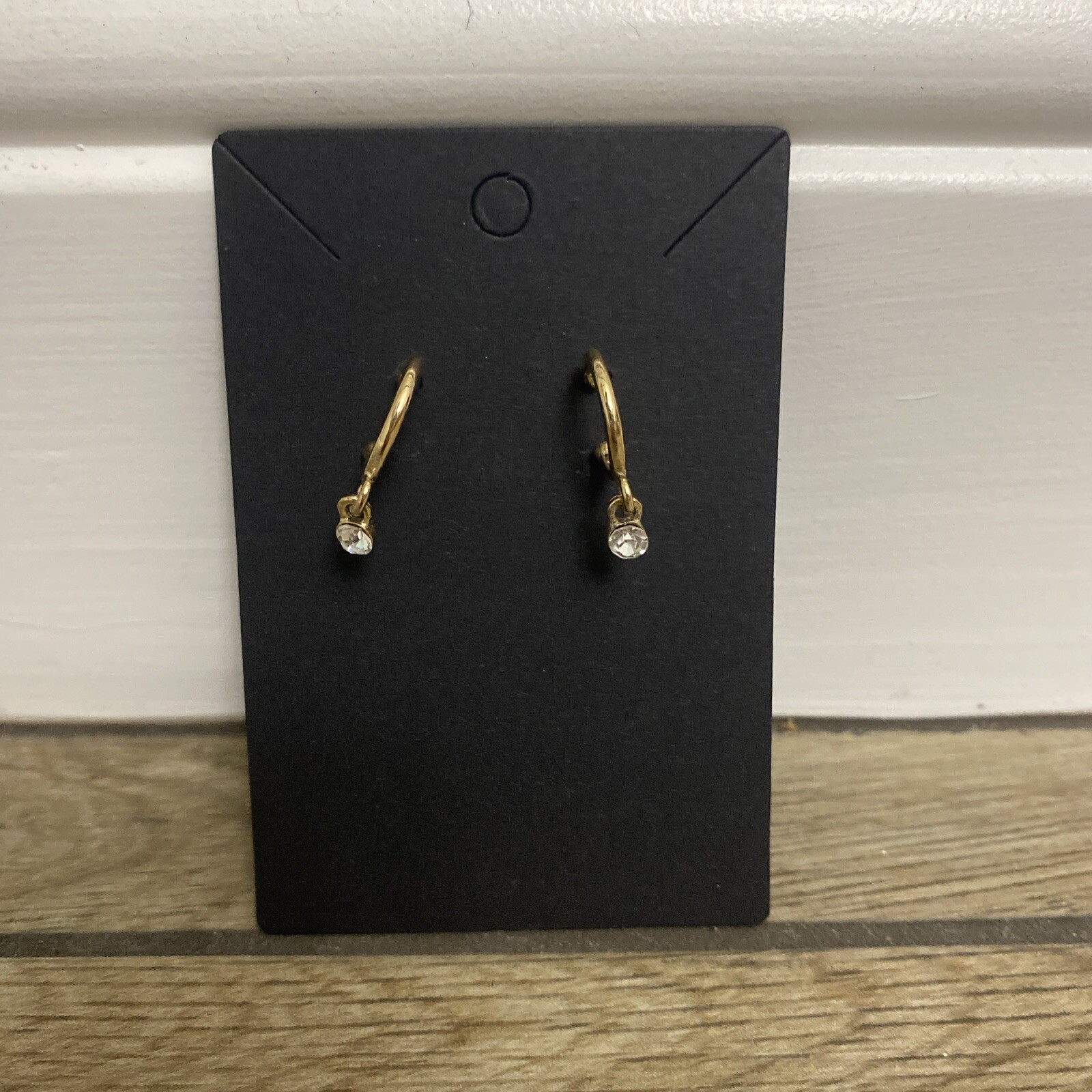 Stylish Gold Hoop Earrings Featuring Dangling Rhinestone Accents for a Glamorous Look