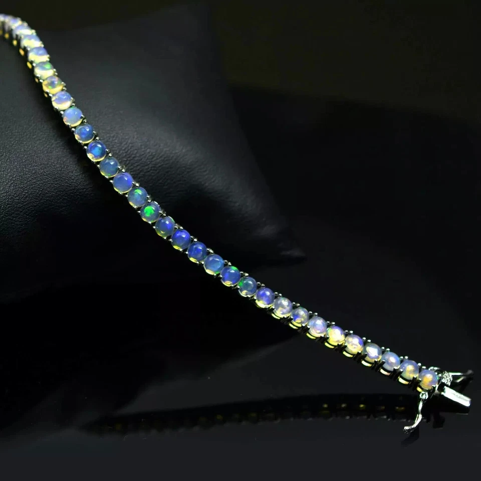 Brazalete de tenis de ópalo de fuego de corte redondo de 4 mm enchapado en oro blanco de 14K de 7" Foto 4 de 4