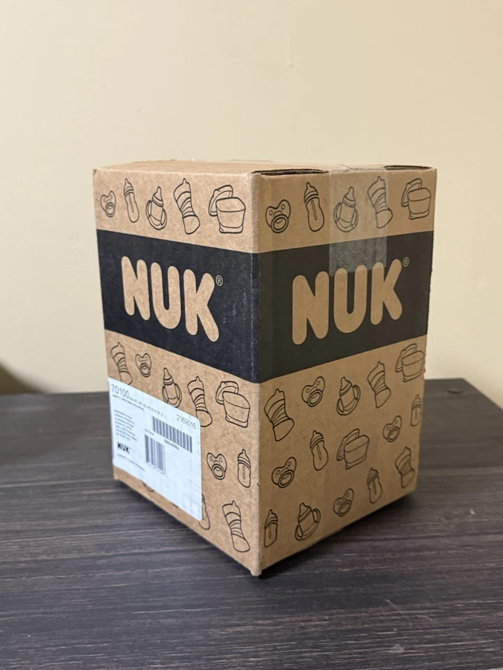 Biberón anticólicos de flujo suave NUK, 10 OZ, paquete de 4, elefante, 4 unidades  Foto 4 de 4