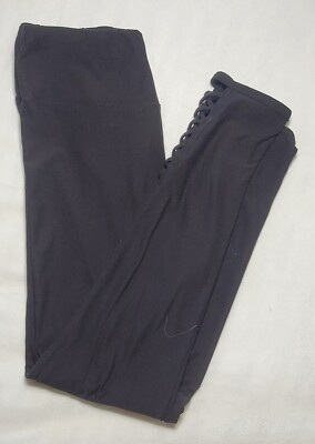 Women junior size medium 7-9 black leggings with Criss-cross ankle design
