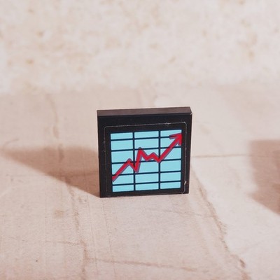 LEGO Graph Up or Down Chart Progress Stock Market Wall Street Stocks Bonds Stick