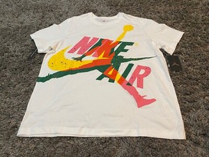 white and green jordan shirt