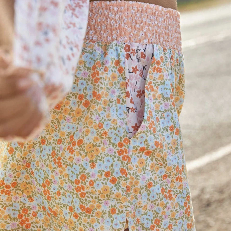 Shorts resort floral American Eagle laranja boho estampa mista bolsos cintura alta M - Imagem 3 de 4