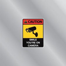 Caution Sign Smile You're On Camera Security Front Static Cling By is 6" x 5"