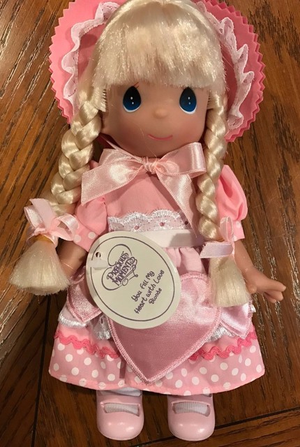 retired precious moments dolls