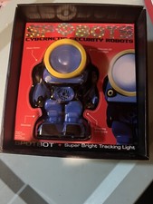 SPYBOTS Cybernetic Security Robots Red T.R.I.P. LED Tripwire Alarm Robot NEW