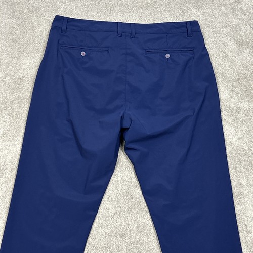 Pantalones de cercanías Rhone para hombre chinos azul marino 34 33" entrepierna exterior senderismo golf poliéster - Imagen 9 de 14