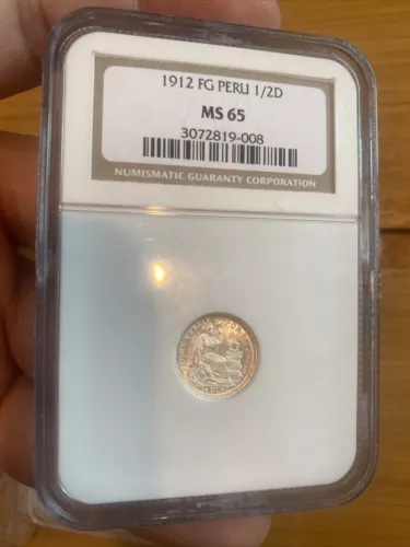 1912 FG Peru 1/2 Dinero NGC MS65 Key Date Blazing White Luster Slight Gold Hue