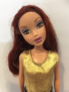 barbie doll with brown hair and brown eyes