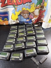 Lot Of 24 Unication Alpha Elegant, Elite, Gold, Legend Numeric Pagers/Beepers