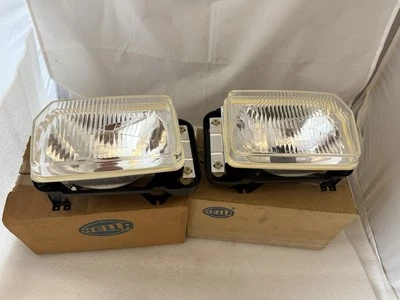2x VW Derby 1 Mk I Haupt Scheinwerfer LI+RE Hella (XB53) NEU NOS - Bild 1 von 4