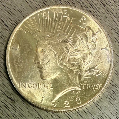 1923 Silver Peace Dollar, Brilliant Uncirculated, Yellowish-Gold Toning!