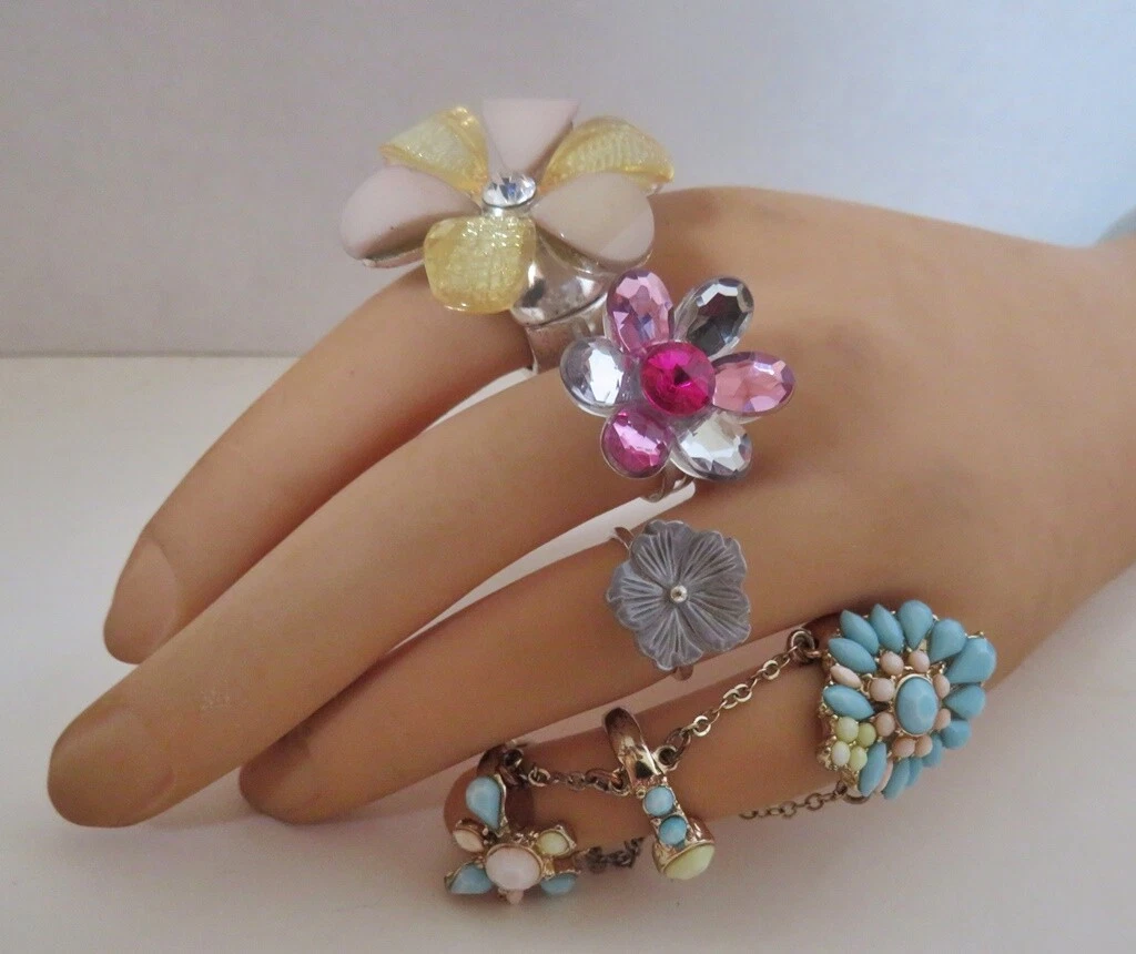 Collection of 4 Flashy Flower Power Rings eBay