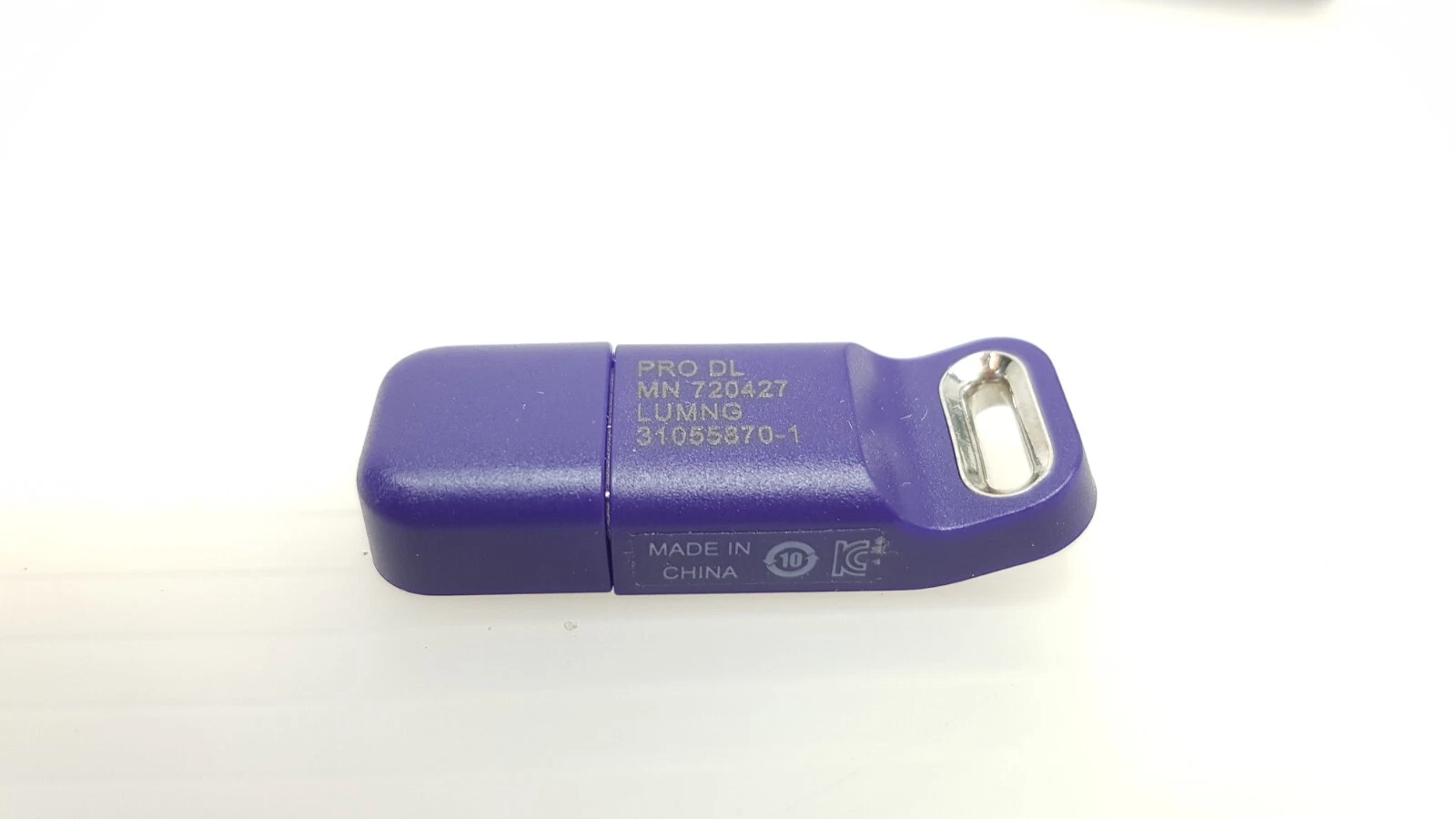 Reverse of the Lumenis KT-10039610 key engraved PRO DL with Made in China marking