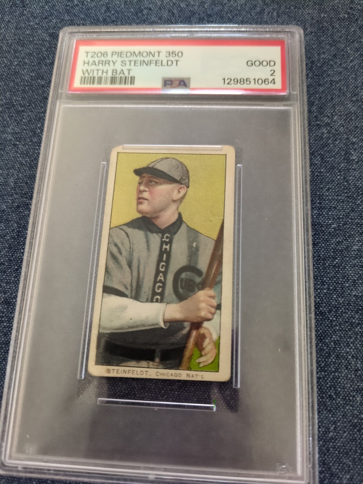 1909-11 T206 Piedmont Harry Steinfeldt With Bat (RC) Newly Graded PSA 2 GOOD 