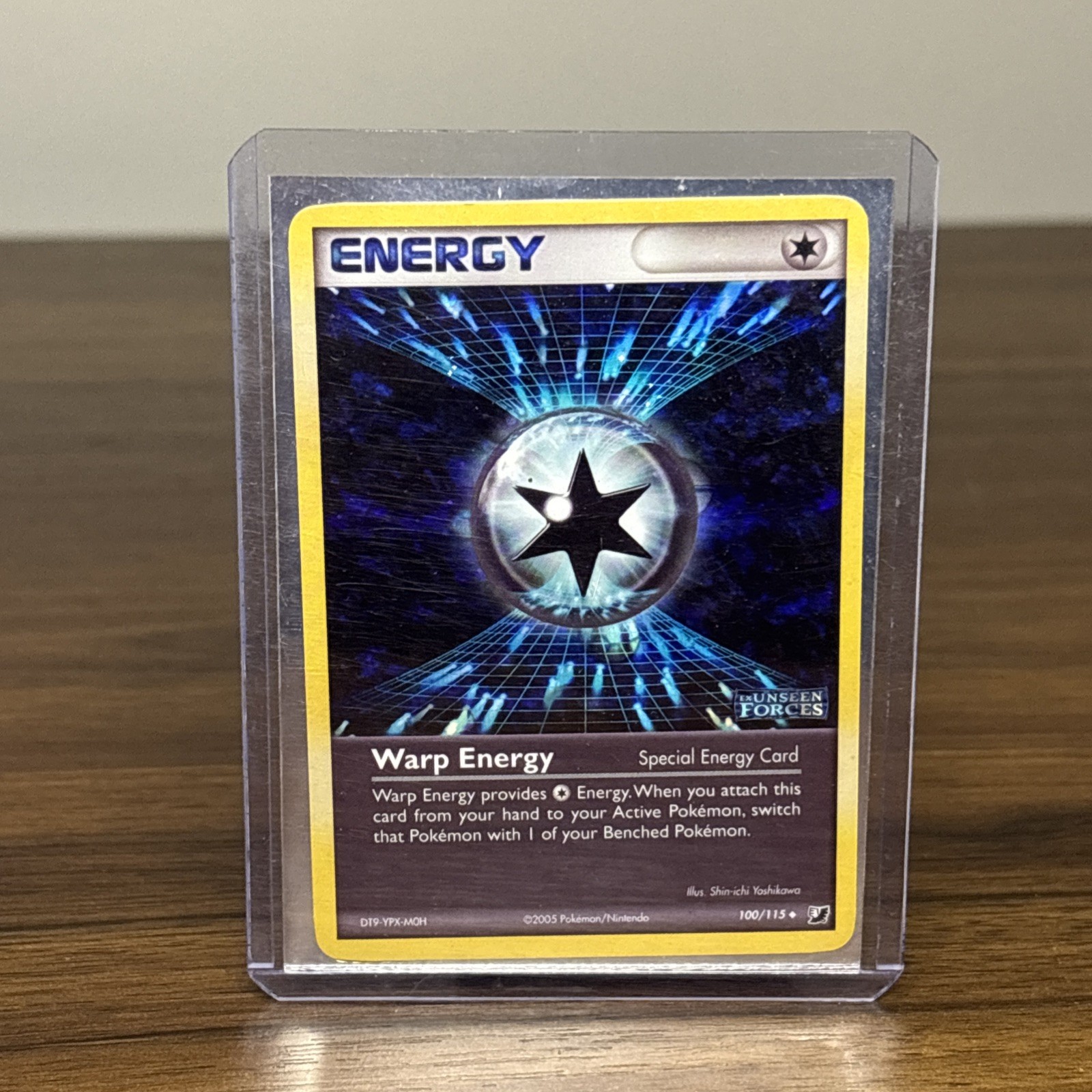 Warp Energy #100/115 Unseen Forces - Reverse Holo Stamped Pokemon Card