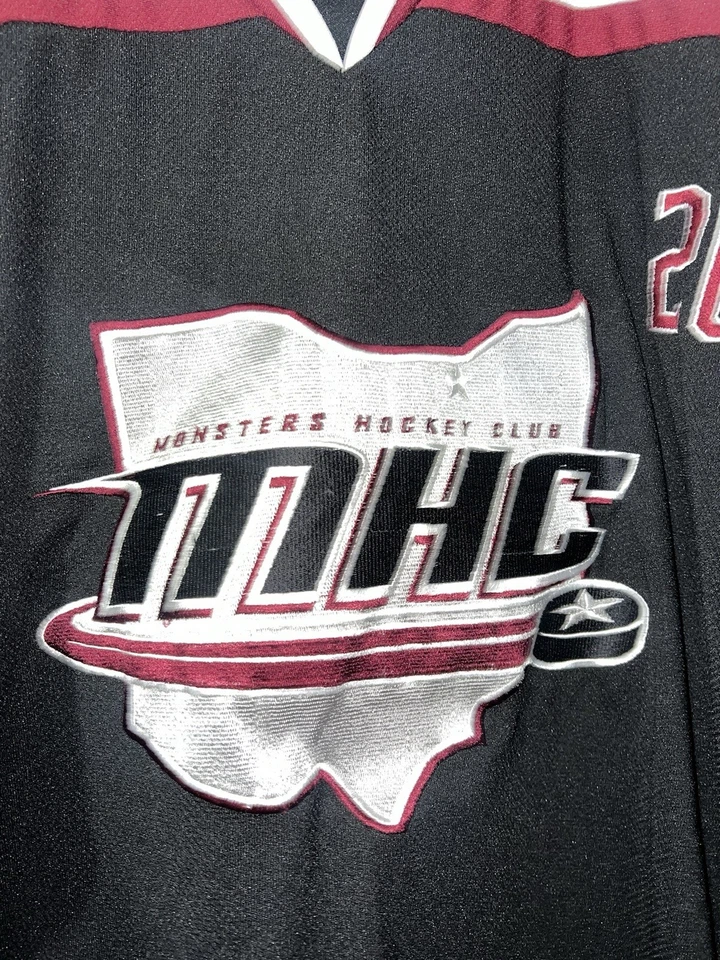 CAMISETA DE HOCKEY DE LIGAS MENORES DE LOS MONSTRUOS DEL LAGO ERIE COSIDA L CLEVELAND Foto 2 de 4