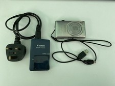 Canon IXUS 220 HS 12.1 MP 5x Zoom Lens Digital Camera In Silver