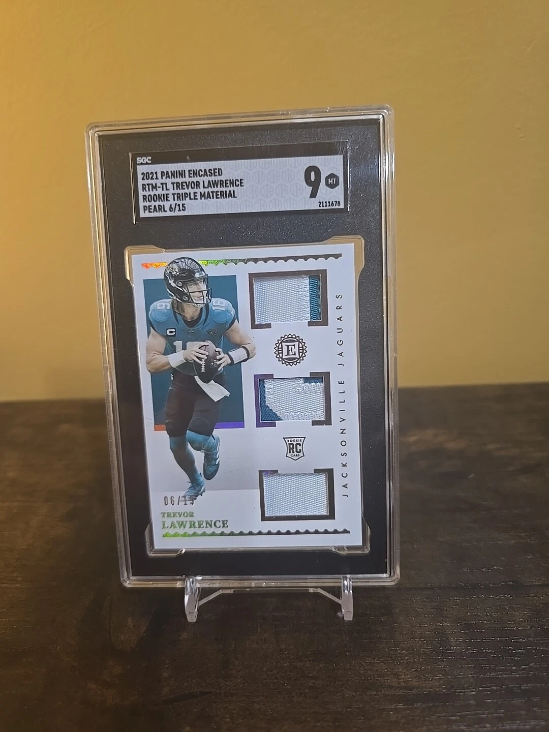 Trevor Lawrence Panini Encased Rookie Triple Memorabilia #RTMTL Pearl