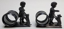 PAIR of Meridan Silverplate Figural Napkin Rings--Child Feeding Dog
