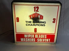 TRICO THE RAINING CHAMPIONS WIPER BLADES WASHERS SOLVENT PLASTIC CLOCK LIGHTED