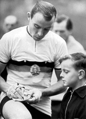 The Leipzig cyclist Klaus Ampler gives an autograph to a Berlin bo- Old Photo