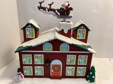 Christmas Advent House 25 Days Light Up Moving Santa Roof Battery Musical