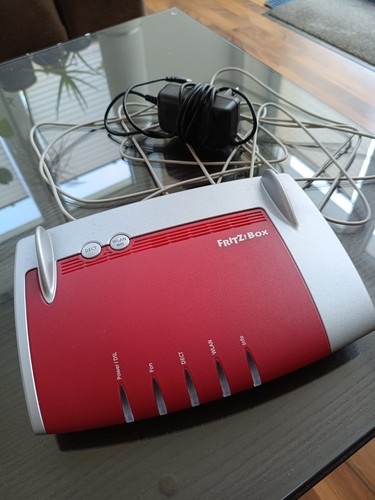 Fritz Box 7430 DSL WLAN-Router mit Anschlusskabeln und Netzteil