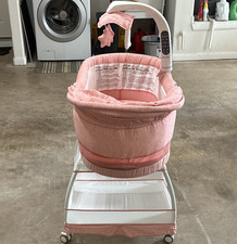 Bliss Pink/White Oval Baby Bassinet with Stand, Wheels, Canopy, Basket