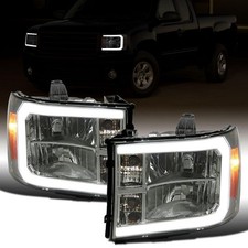 - Fits 2007-2013 GMC Sierra 1500 Halogen Headlights Pair Smoke