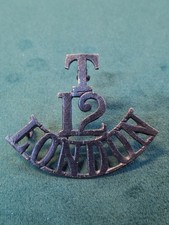T 12 LONDON REGIMENT TERRITORIAL SHOULDER TITLE BADGE BLACKENED BRASS ORIGINAL