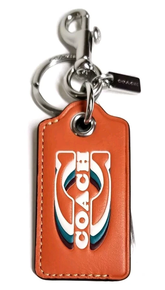 Llavero abridor de botellas Coach con sello plata naranja brillante cuero nuevo con etiquetas Foto 4 de 4