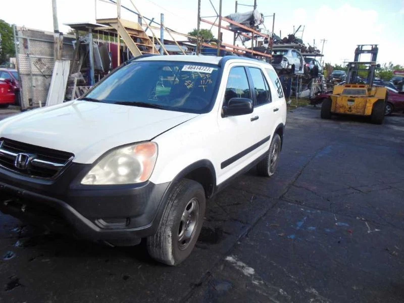 Manija interior puerta trasera izquierda Honda CR-V 2004 Foto 3 de 4